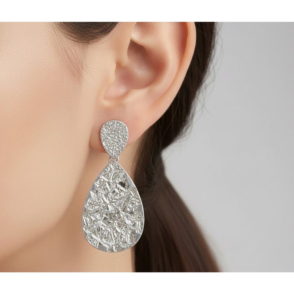 Trendy 2" clip on silver textured dangle solid teardrop earrings